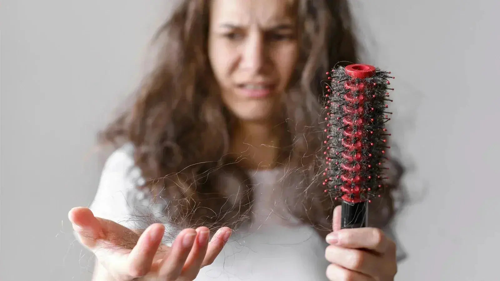 How to Stop Hair Fall Naturally: A Complete Guide HELI Cosmetics